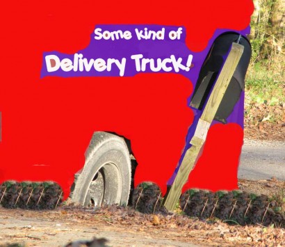 Delivery truck stuck in ditch. Delivery truck stuck in ditch.