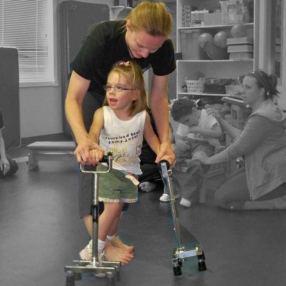 Ellie practicing using canes.