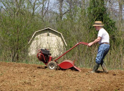 Hard at work rototilling the garden.