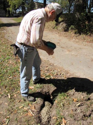 Fixing the source of the cavitation. photo of man fixing broken pipe