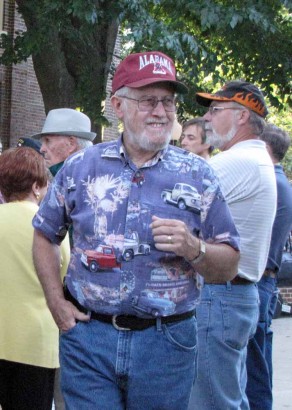 Farmer at Fiddler's Convention picture of man with BAMA cap on