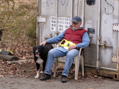 picture of man and farm collie dog